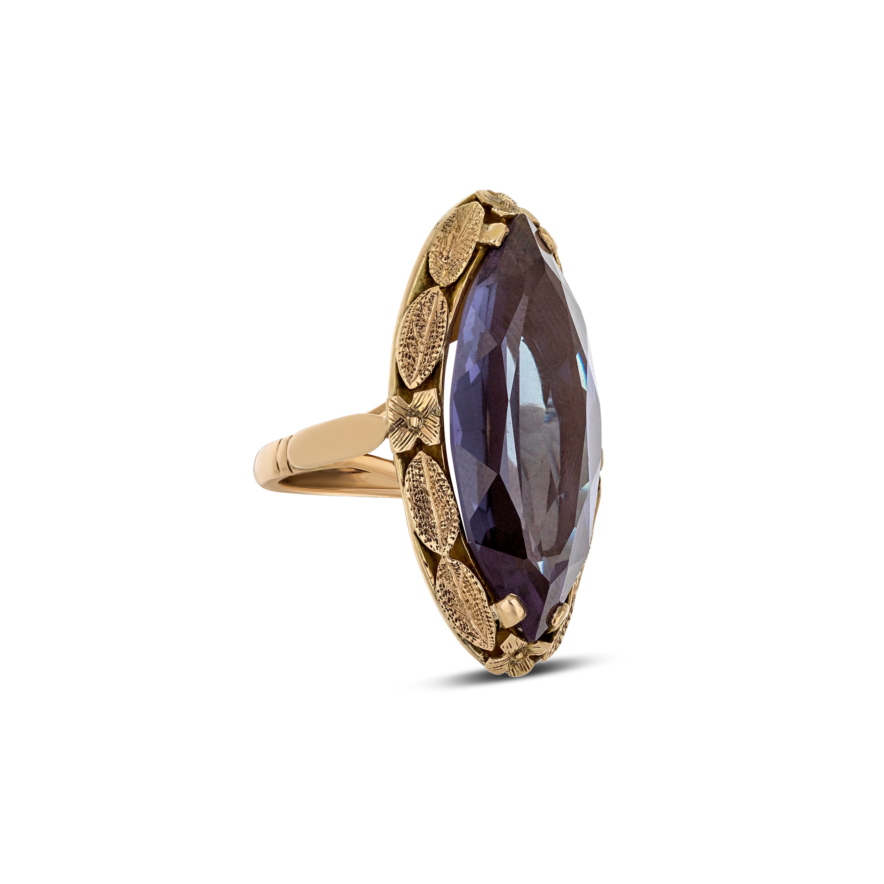 14k Gold Marquise Color Change Synthetic Sapphire with Leaf Detail around the Bezel Ring