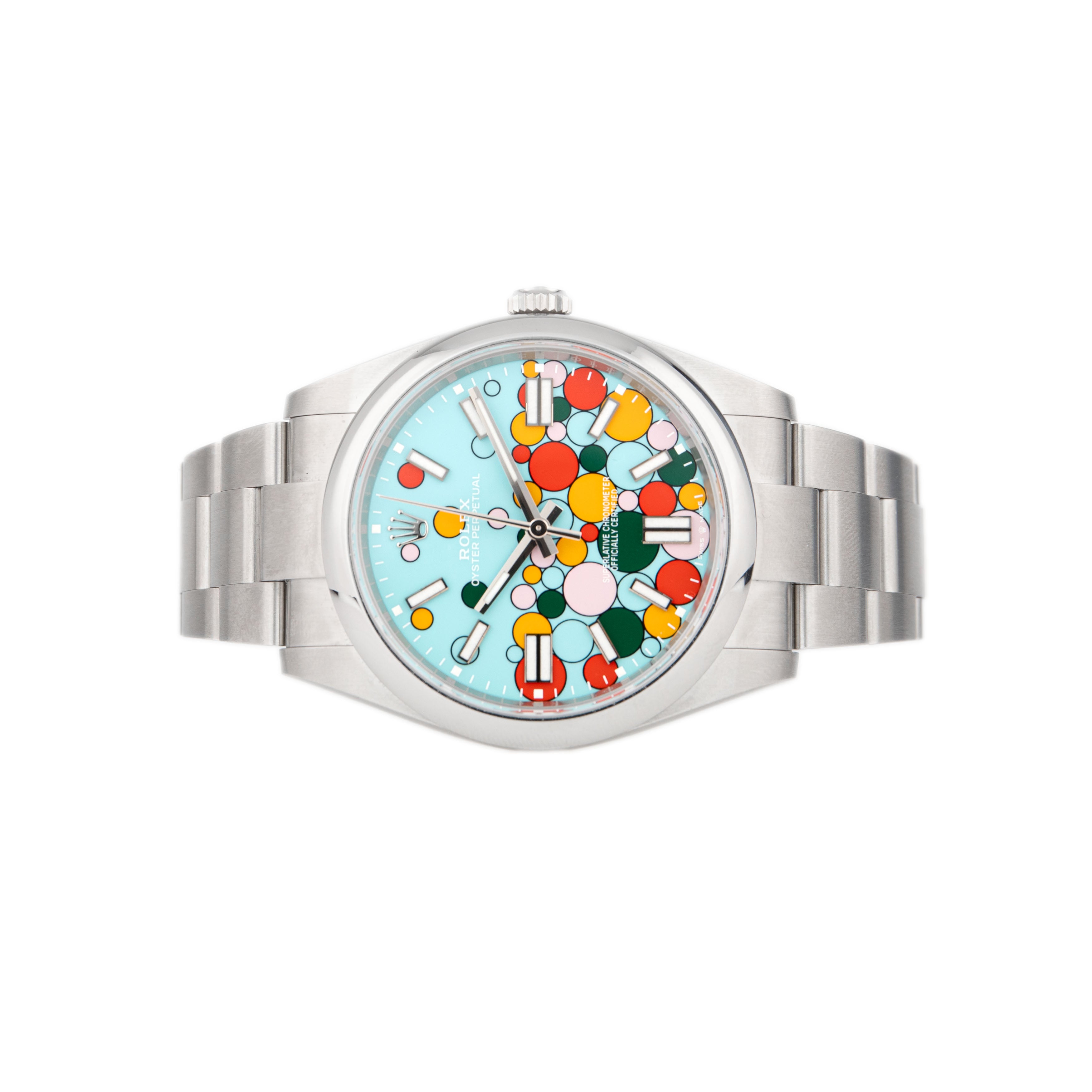 Rolex Oyster Perpetual Stainless Steel Blue Celebration Motif Dial 41mm 124300 Full Set