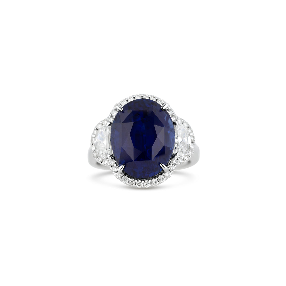 18k White Gold 11.50ct Oval Sapphire and Diamond Halo Three Stone Ring