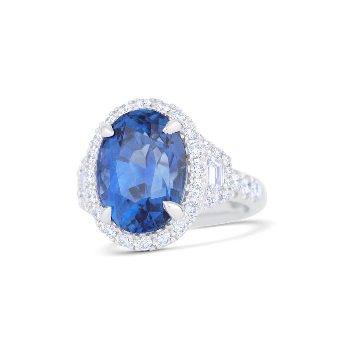 Platinum 12.73CT Oval Sri Lanka Sapphire and Diamond Three Stone Halo Ring