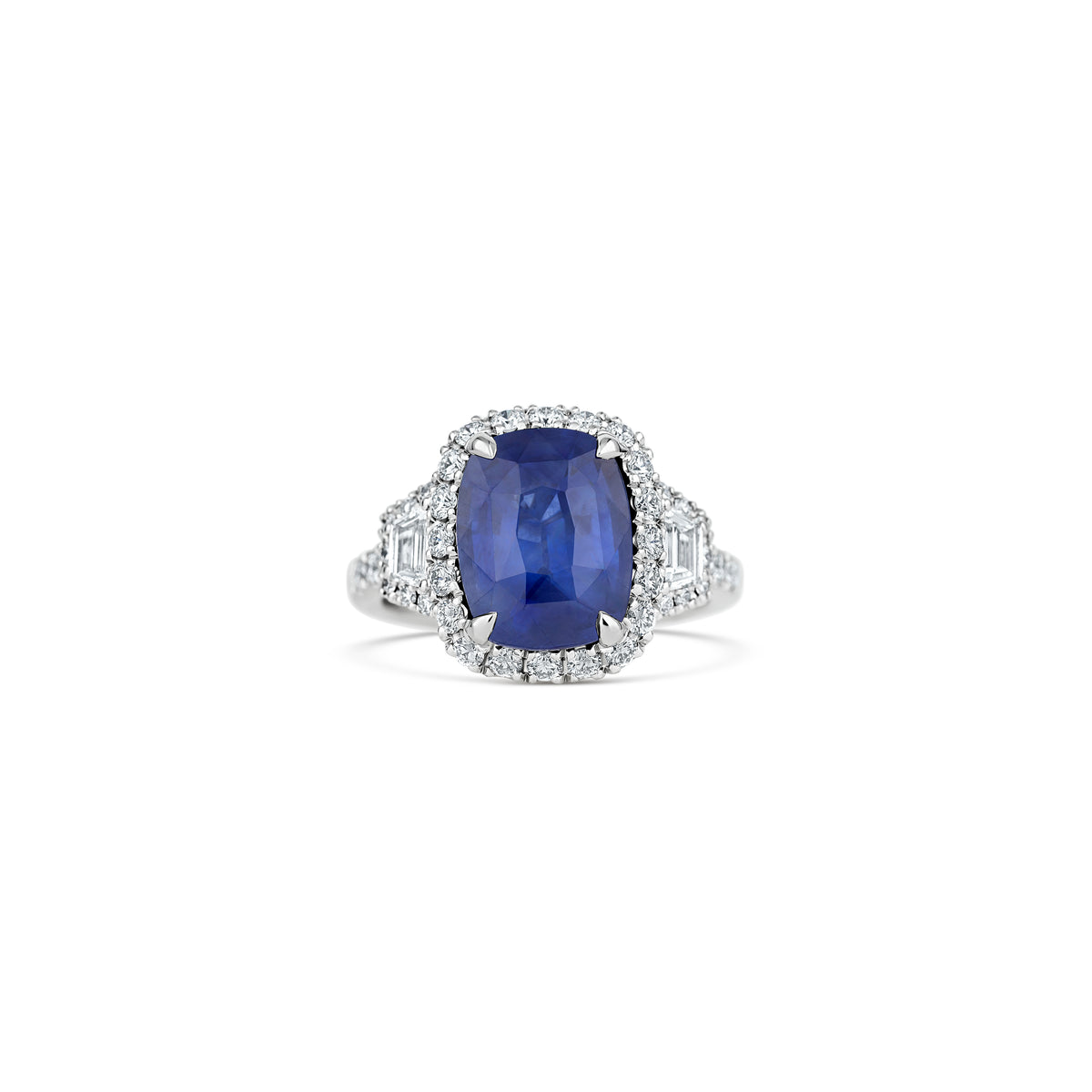 Platinum 6.53ct Cushion Sapphire and Diamond Three Stone Halo Ring