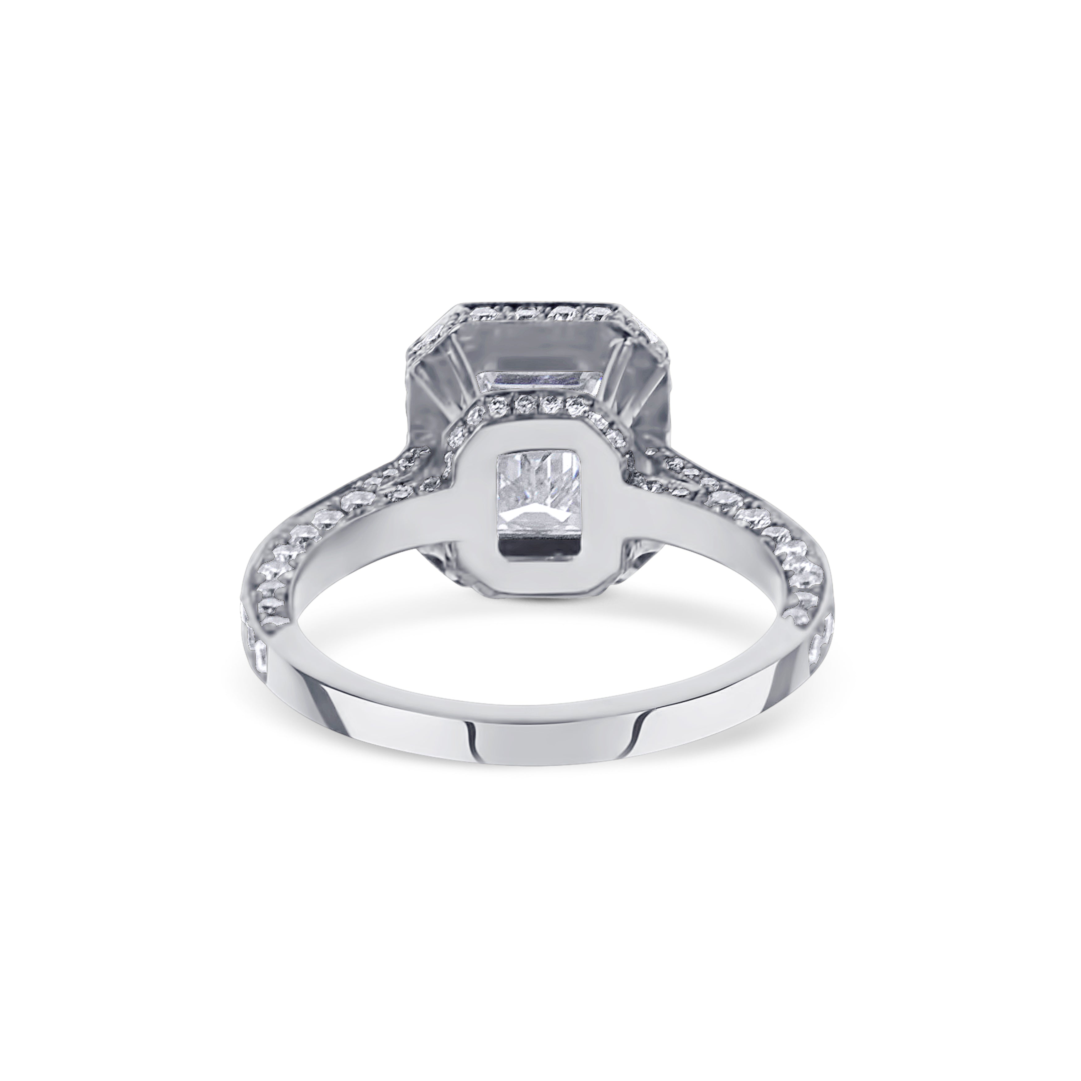 Platinum Emerald Cut Diamond Halo Engagement Ring