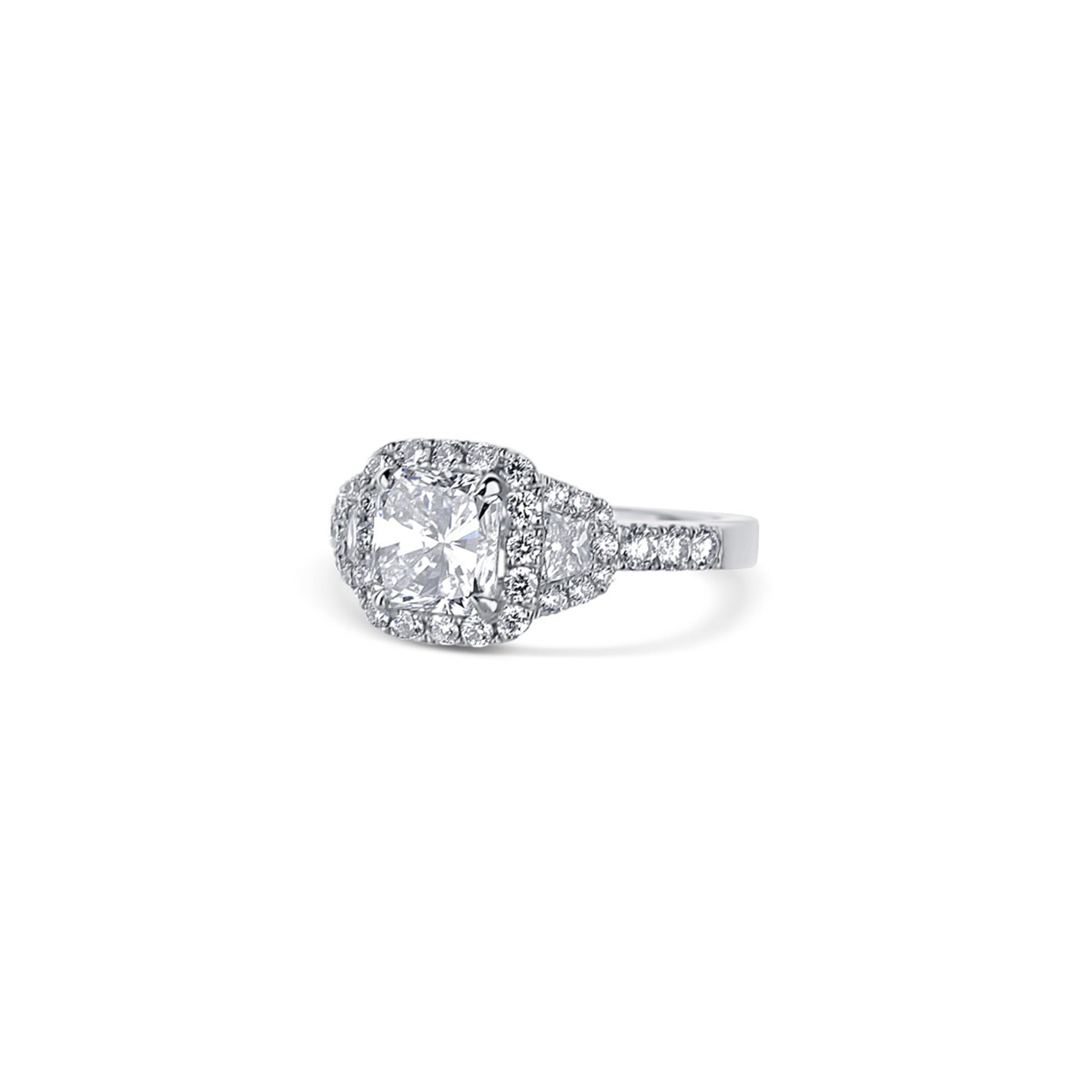 Platinum Princess Cut And Trapezoid Cut Diamond Halo Engagement Ring