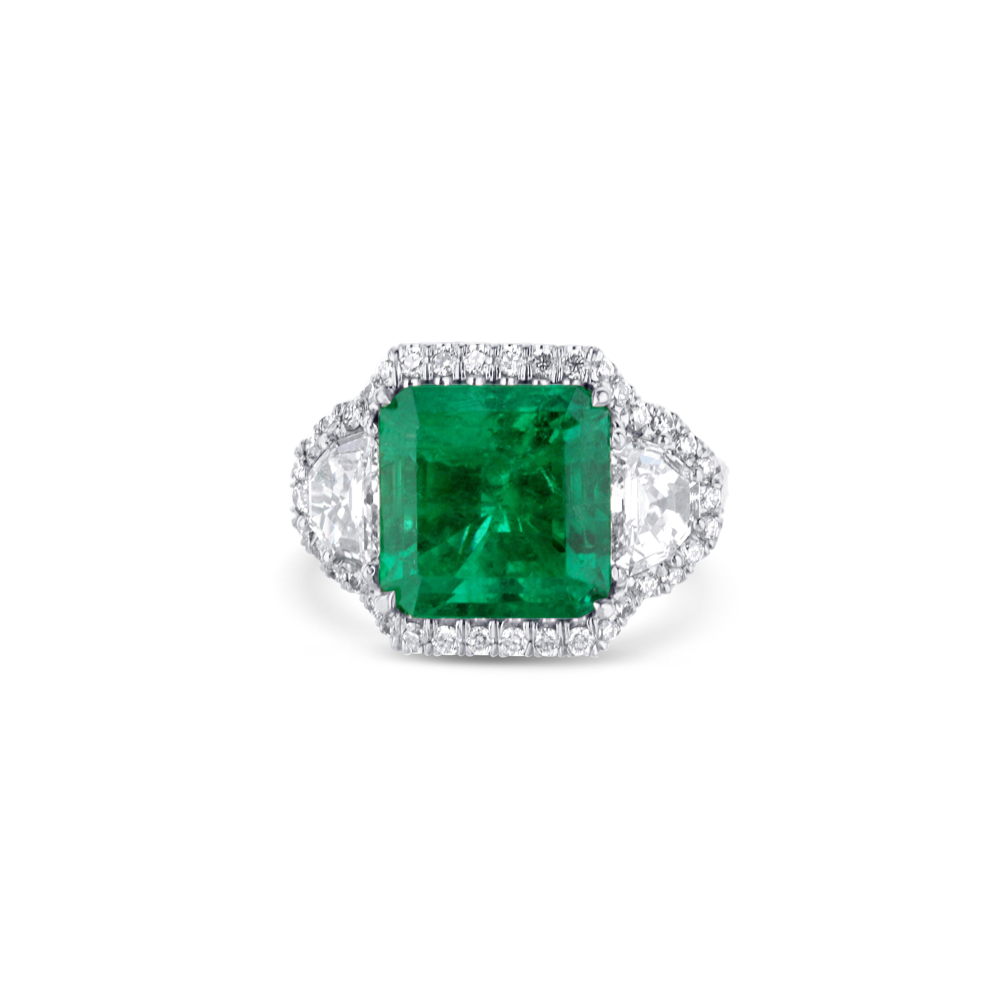 Platinum Emerald-Cut Emerald Engagement Ring With Hexagon-Cut Diamond Accents And Diamond Halo