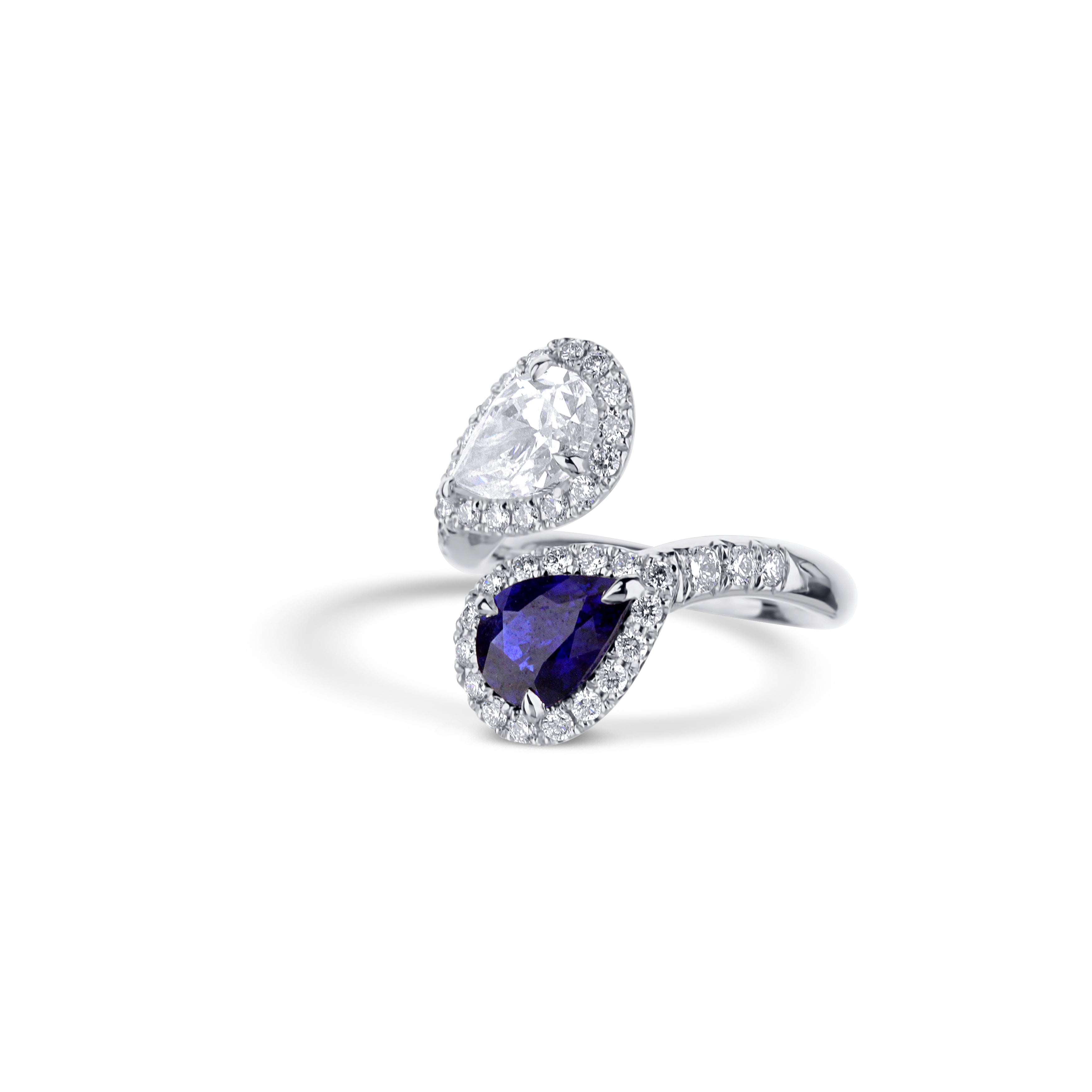 Platinum Blue Pear Cut Sapphire And Pear Cut Diamond Halo Bypass Engagement Ring