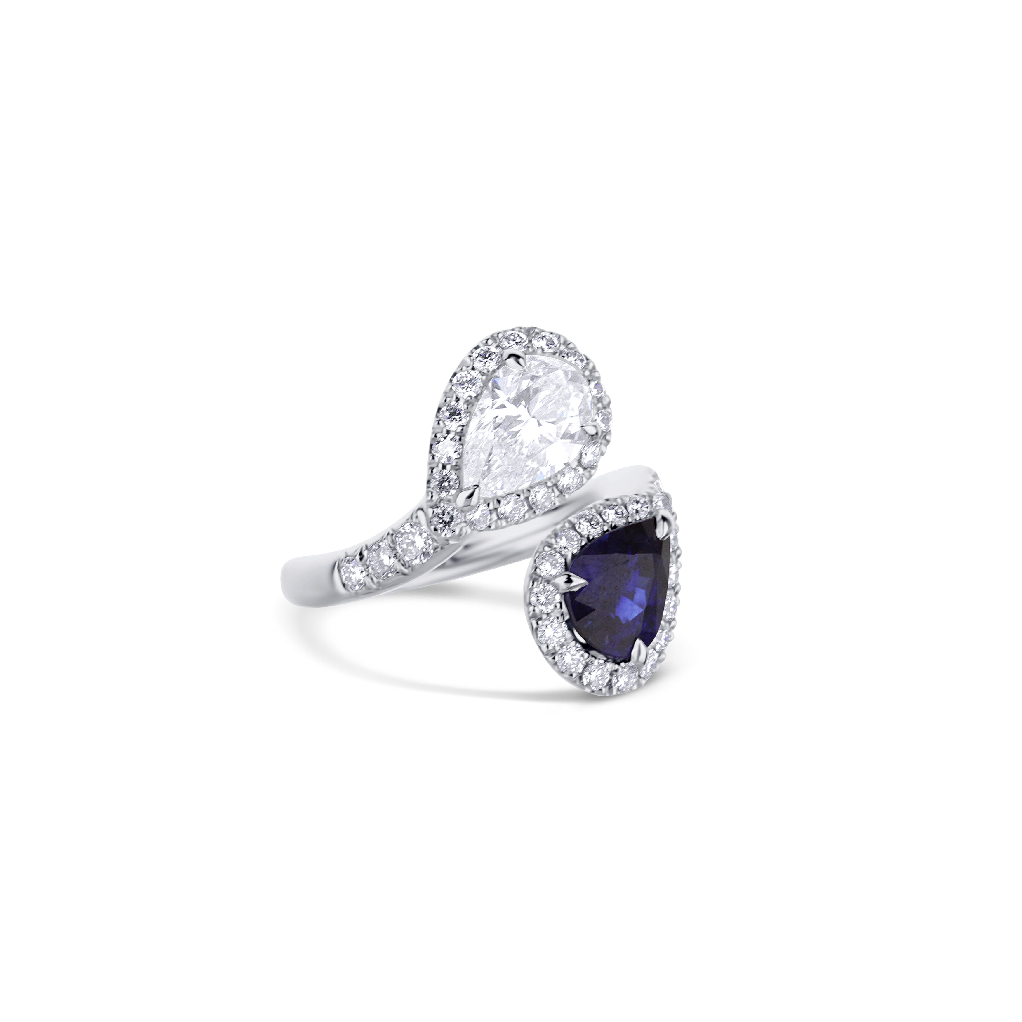 Platinum Blue Pear Cut Sapphire And Pear Cut Diamond Halo Bypass Engagement Ring