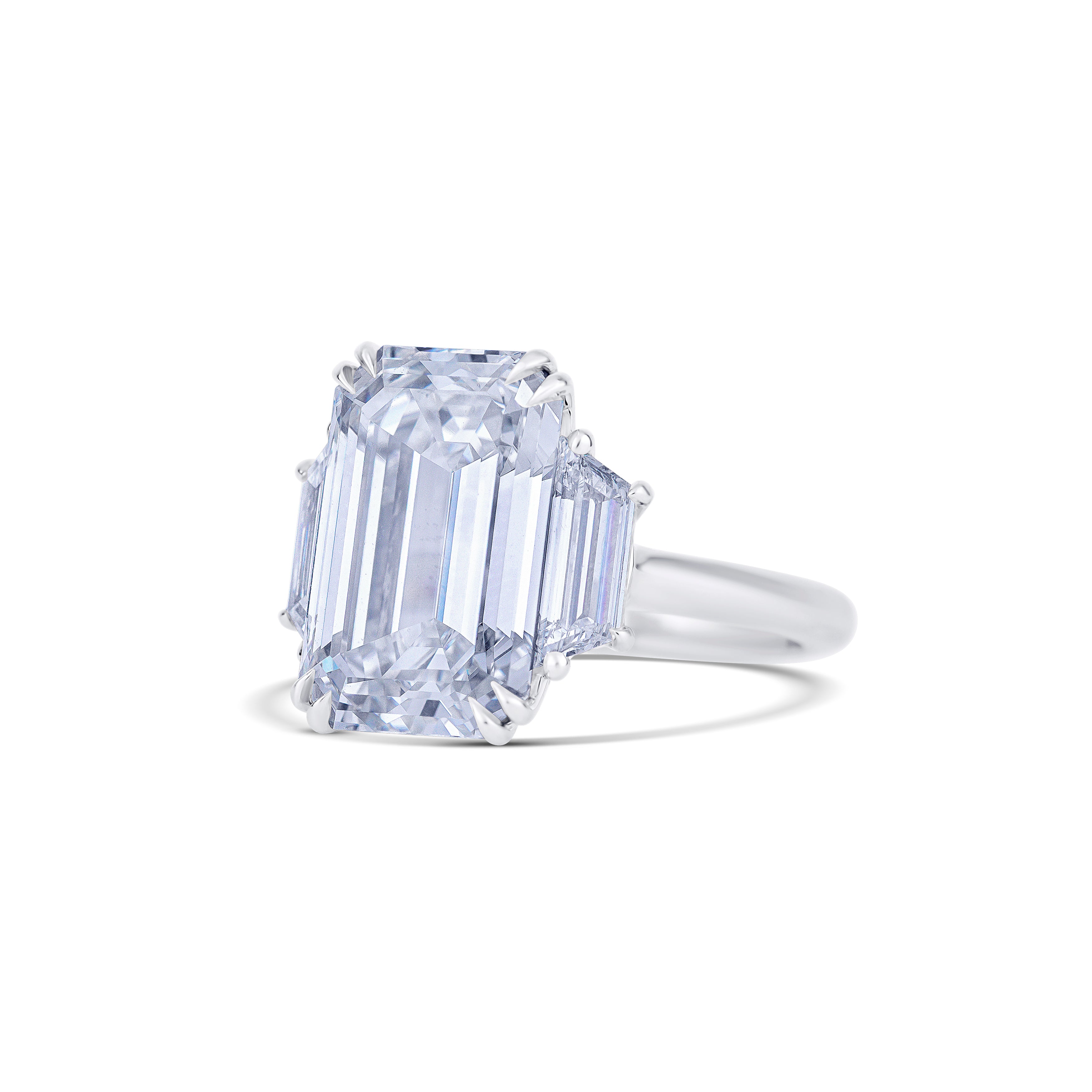 Platinum Emerald Cut Diamond Center Stone with Trapezoid Cut Side Stones Engagement Ring