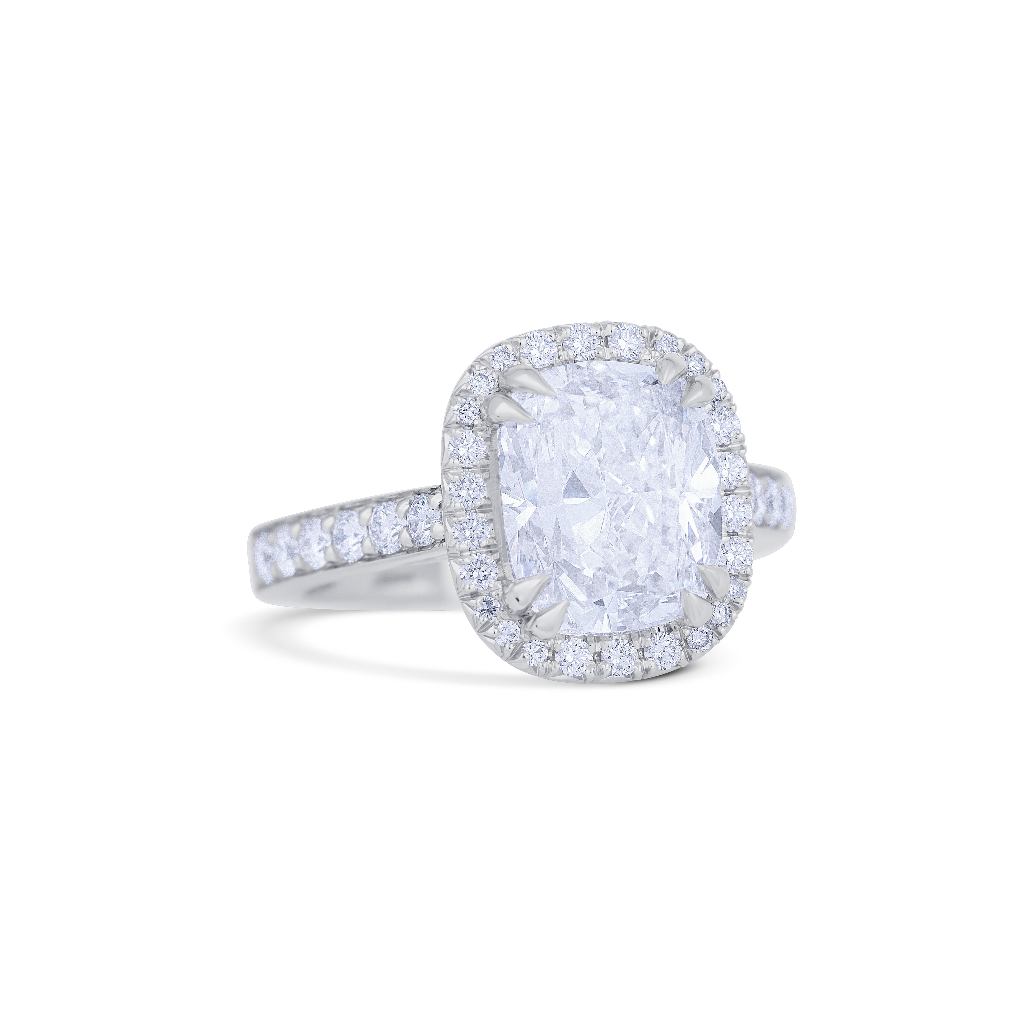 Platinum Cushion Cut Diamond with Round Cut Diamond Halo and Side Stones Engagement Ring