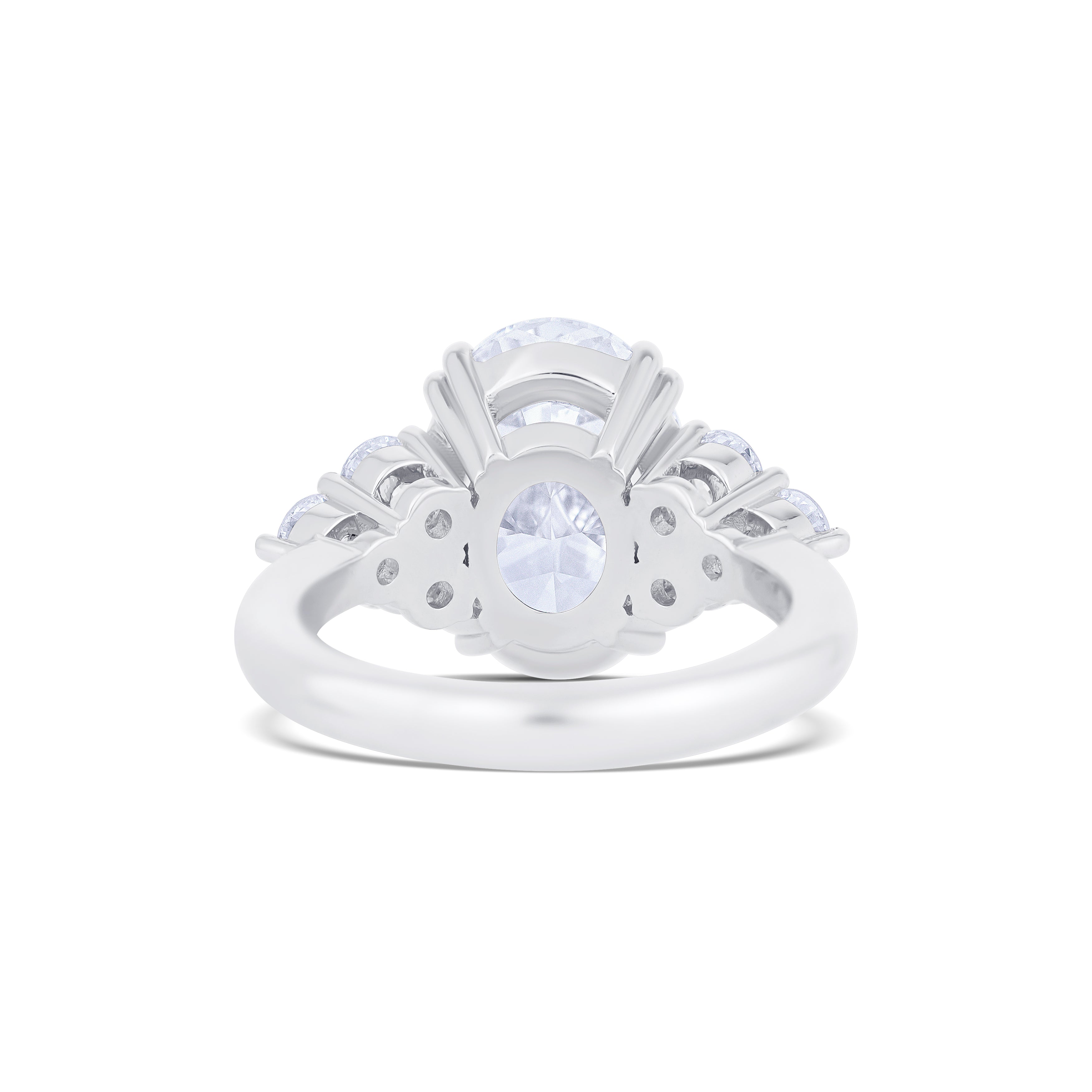 Platinum Oval Cut Diamond with Round Cut 3 Diamond Cluster Side Stones Engagement Ring