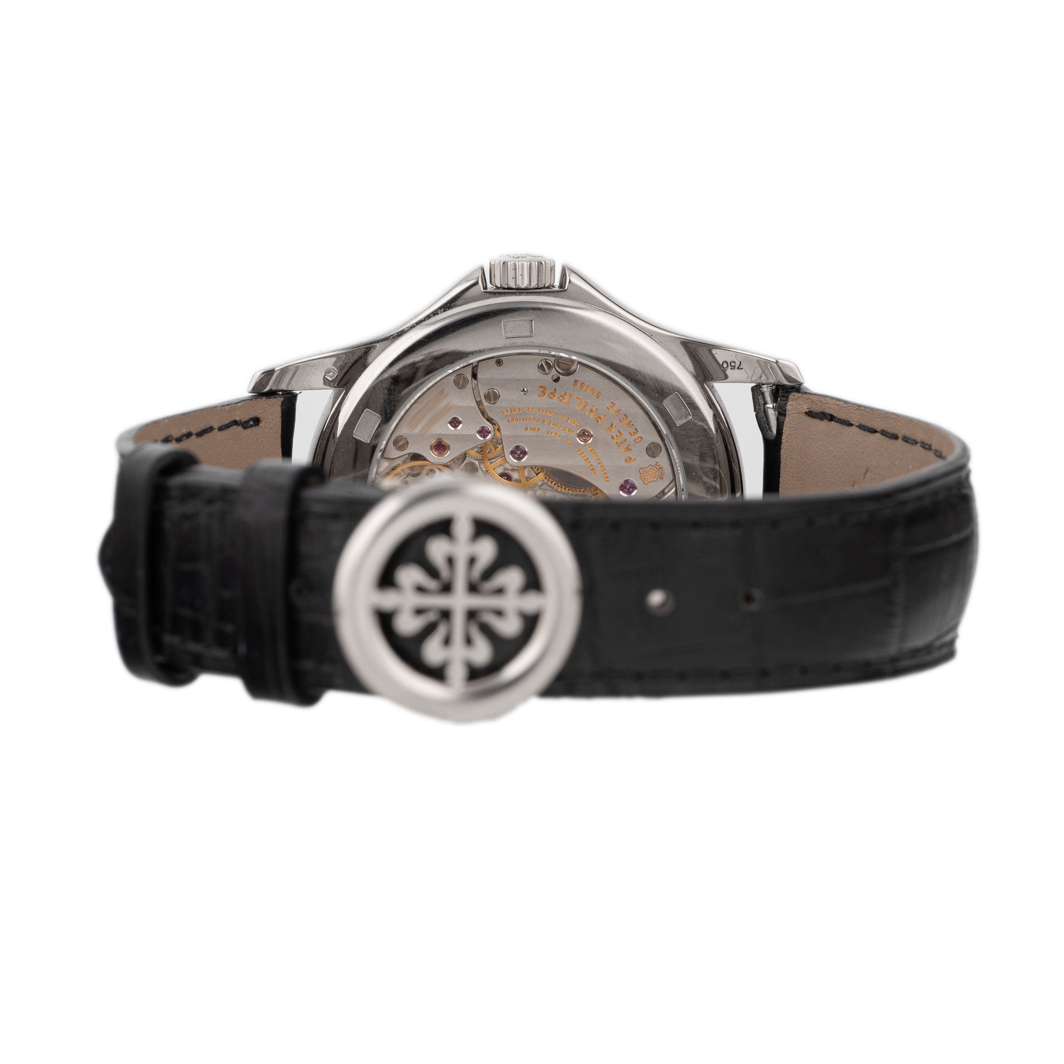 Patek Philippe Complications World Time White Gold Silver Dial 39.5mm 5130G-001