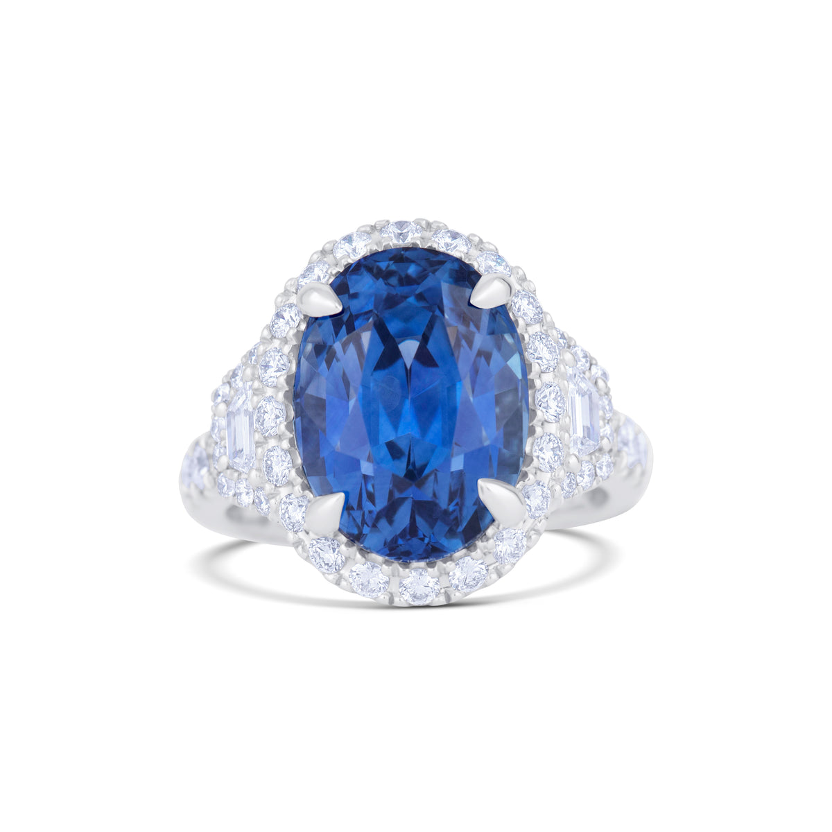 Platinum 12.73CT Oval Sri Lanka Sapphire and Diamond Three Stone Halo Ring