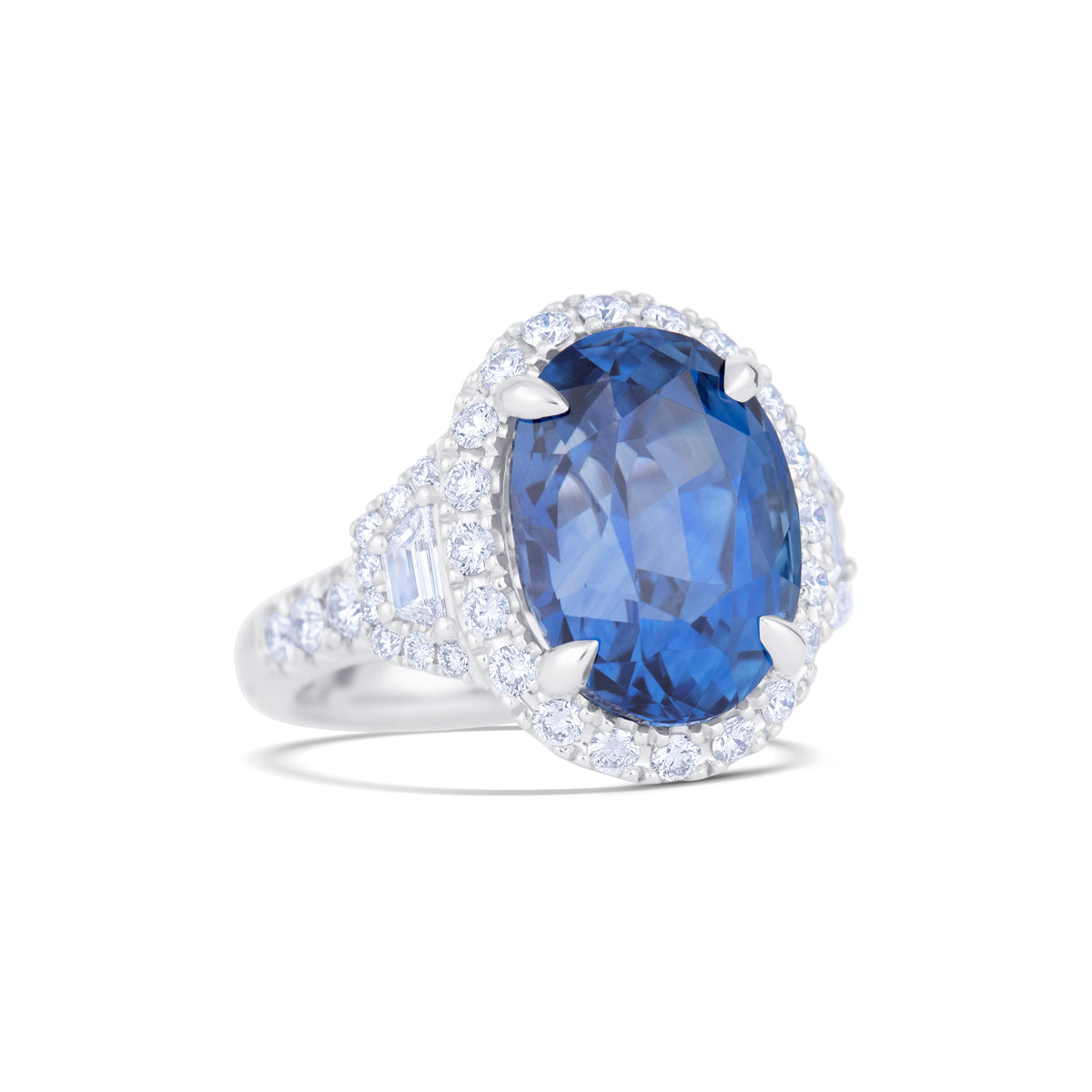 Platinum 12.73CT Oval Sri Lanka Sapphire and Diamond Three Stone Halo Ring