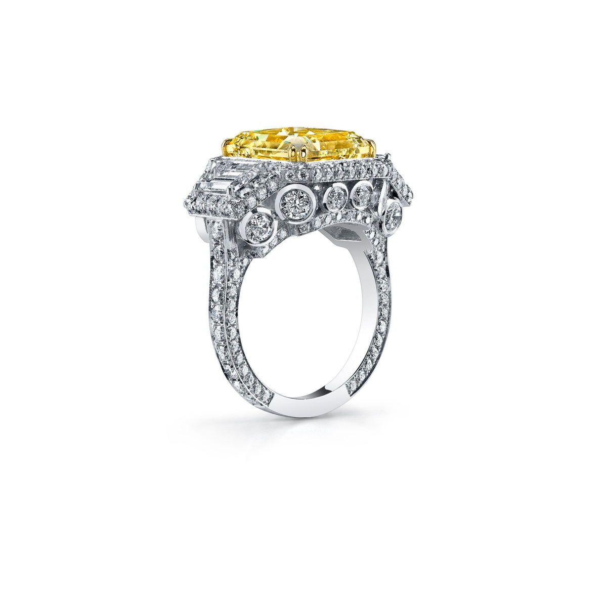 Platinum and 18k Yellow Gold Radiant Fancy Light Yellow Diamond Hidden Accent Three Stone Engagement Ring