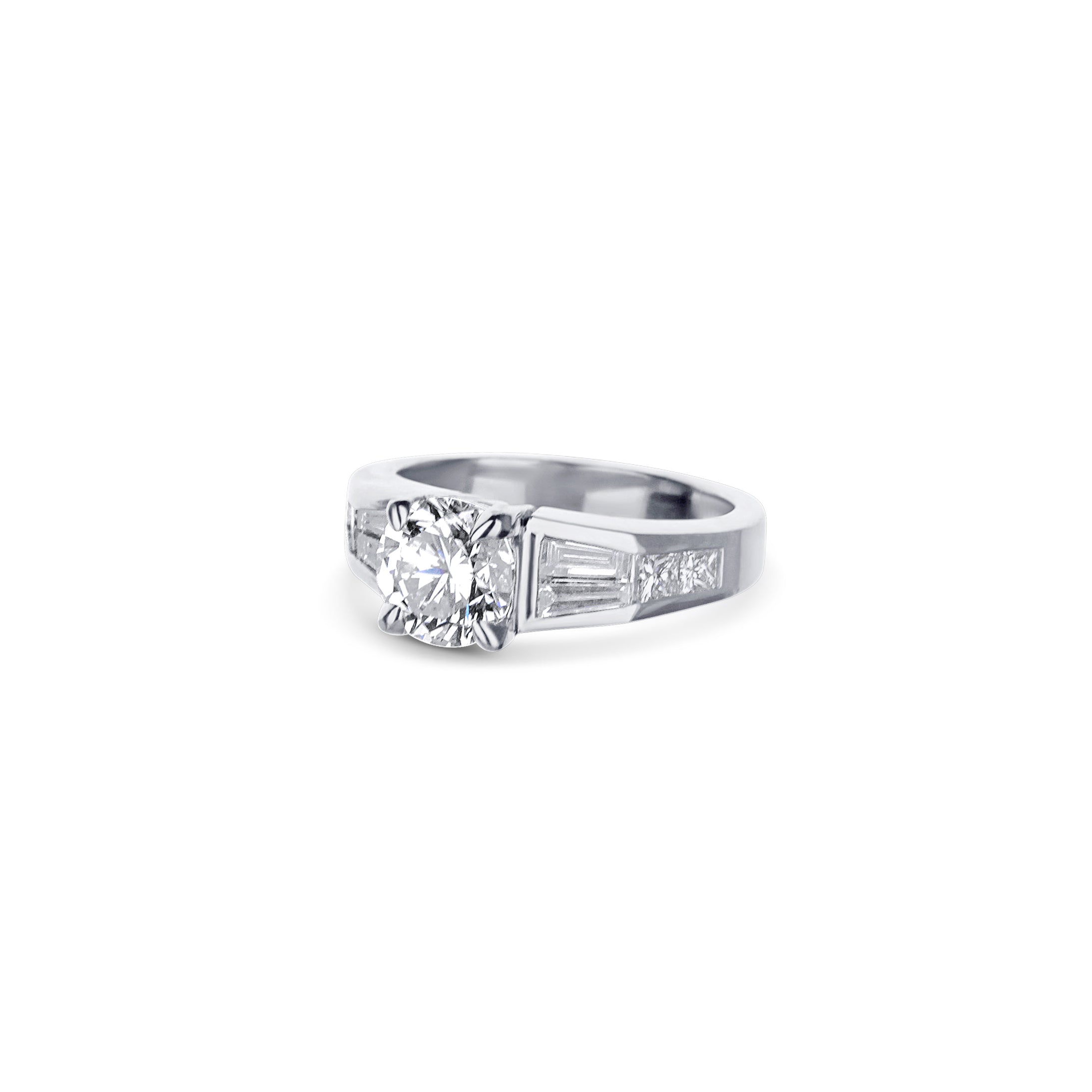 Platinum Round Diamond And Baguette Diamond Engagement Ring