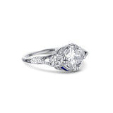 Art Deco Style Diamond Engagement Ring In Platinum With Blue Sapphire Detailing