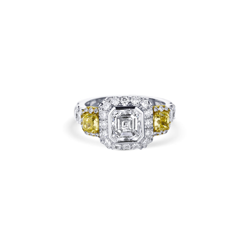 Platinum Emerald Cut Diamond Engagement Ring With Cushion Side Yellow Diamond And Halo