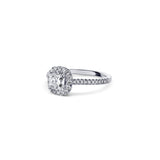 18K White Gold Engagement Ring With A 0.73 Carat Radiant Cut Diamond With Cushion Shaped Halo.