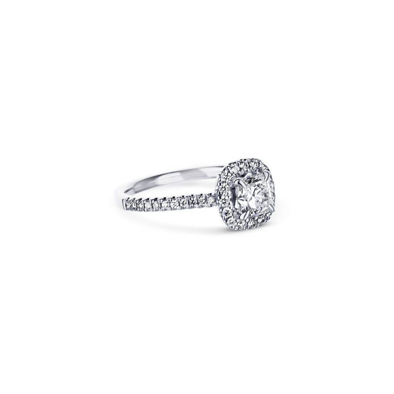 18K White Gold Engagement Ring With A 0.73 Carat Radiant Cut Diamond With Cushion Shaped Halo.