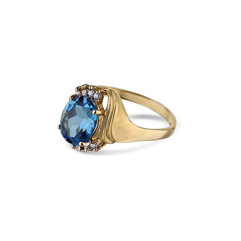 Blue Topaz And Diamond Ring