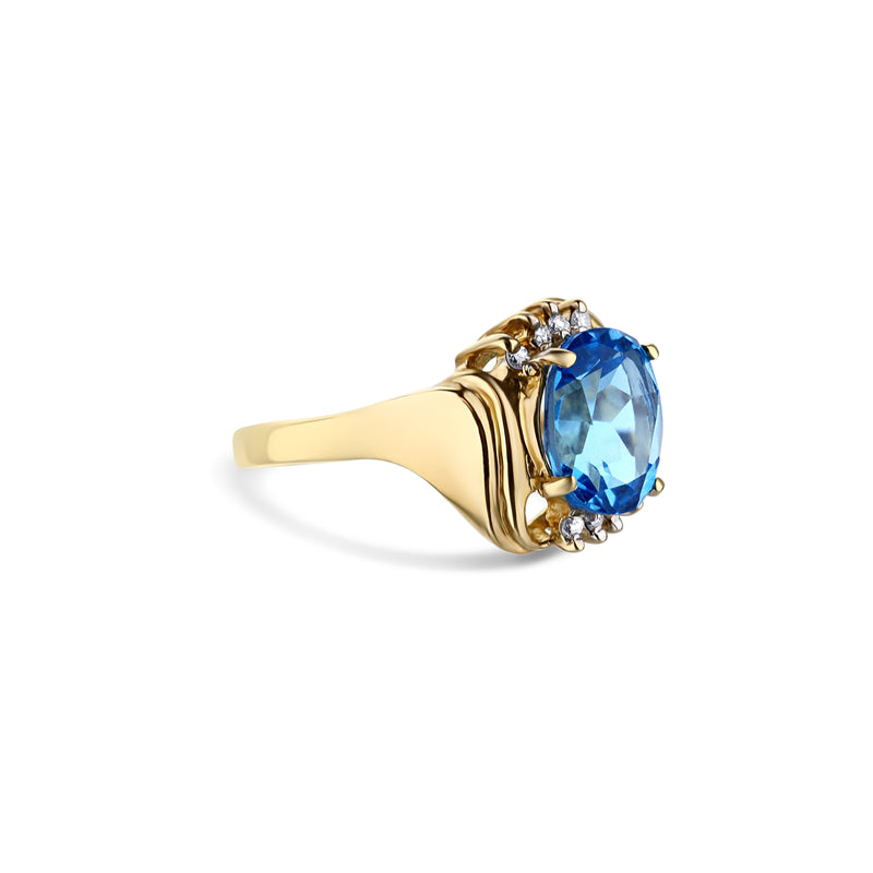 Blue Topaz And Diamond Ring