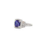 18K White Gold Cushion Tanzanite With Diamond Halo And Baguette Accent Ring