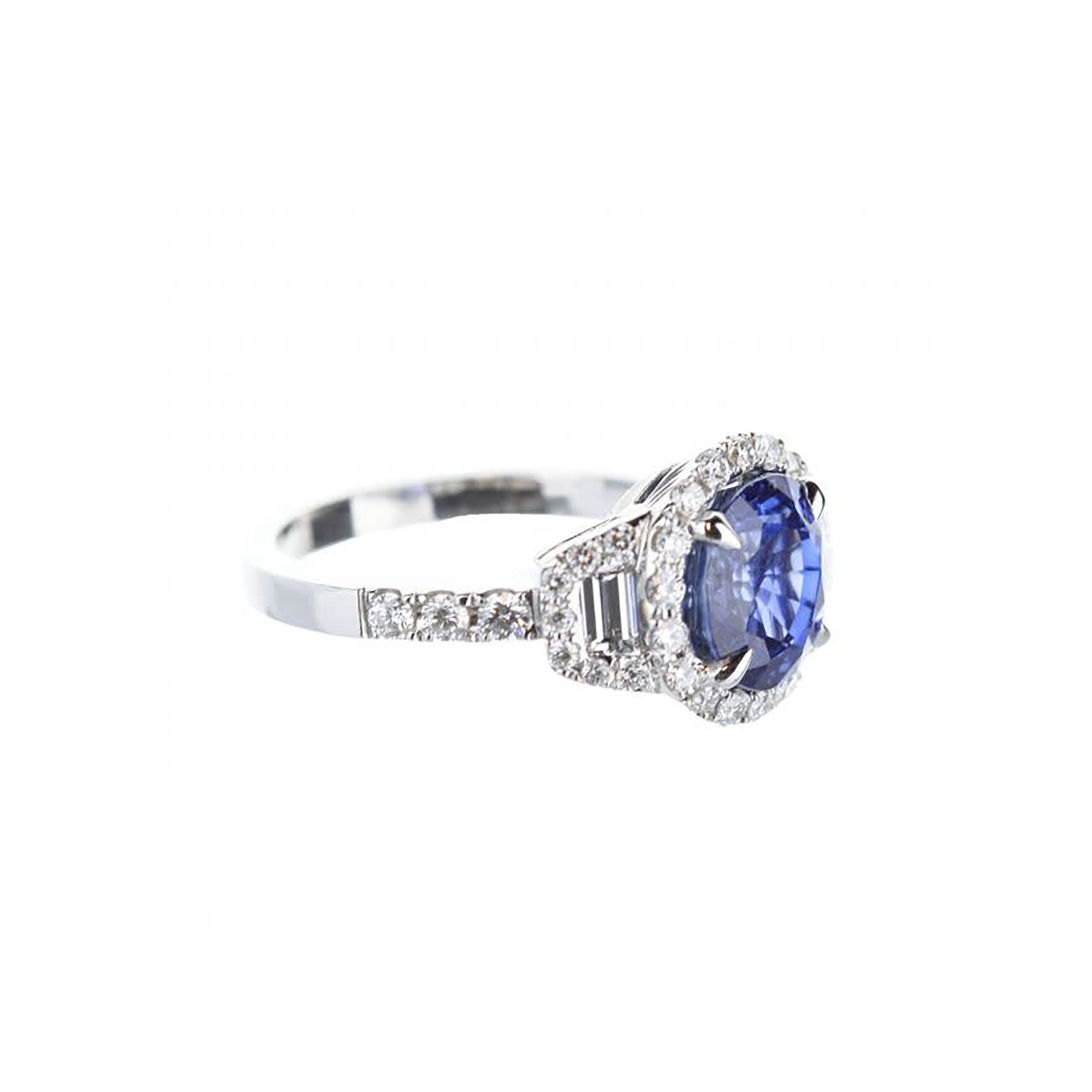 18K White Gold Round Blue Sapphire Engagement Ring With Trapezoid-Cut Diamond Accents And Diamond Halo