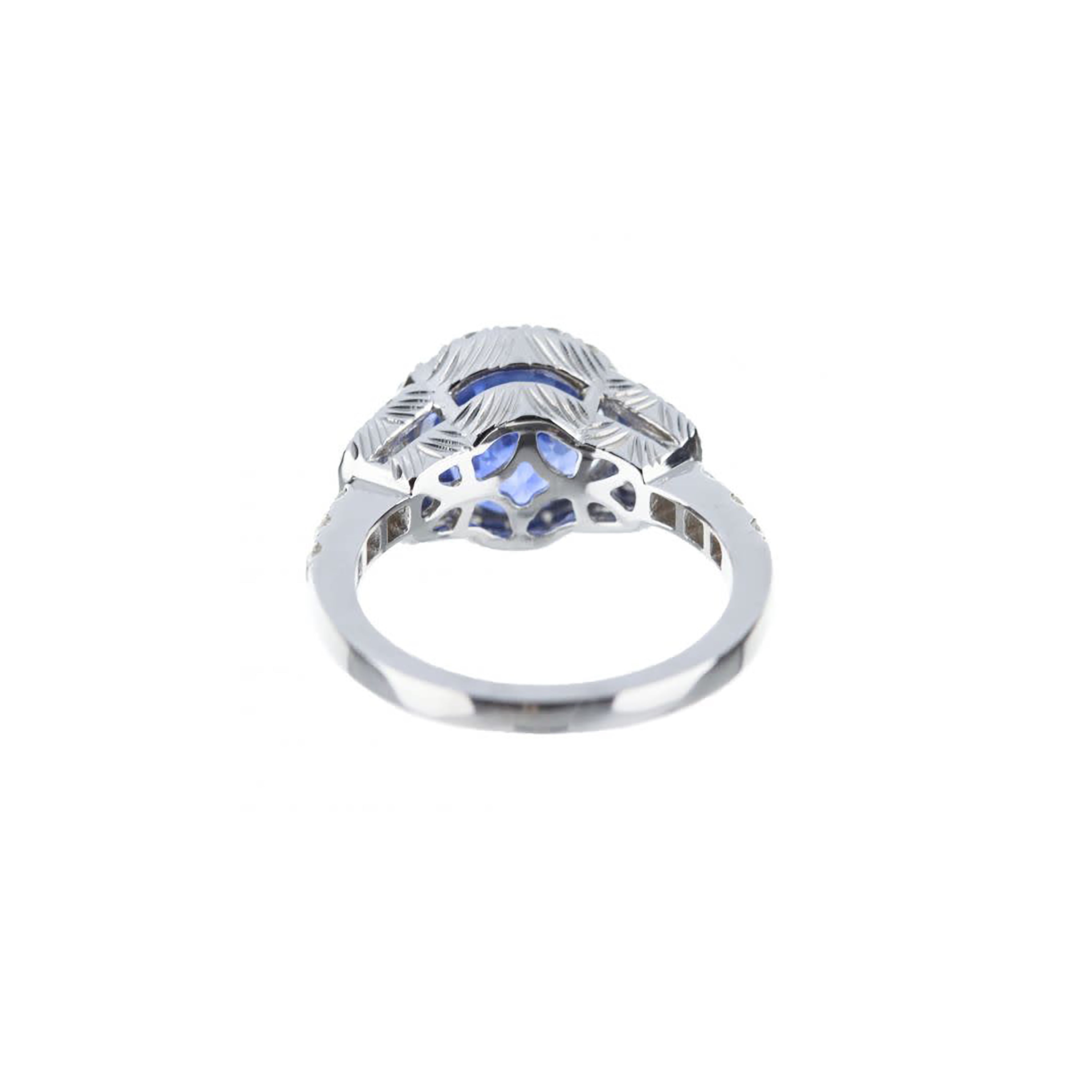 18K White Gold Round Blue Sapphire Engagement Ring With Trapezoid-Cut Diamond Accents And Diamond Halo