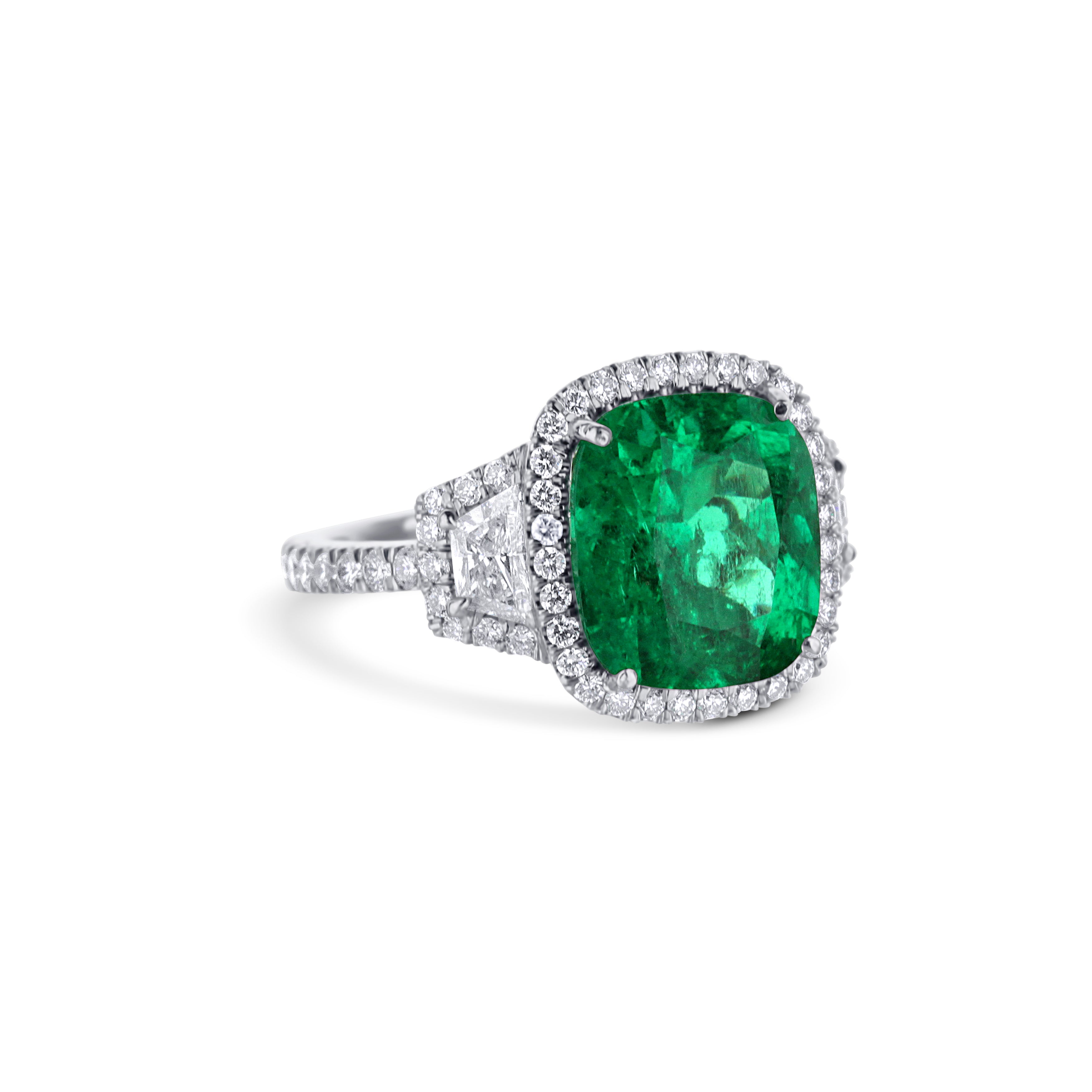 Platinum Cushion Emerald Center Diamond Halo