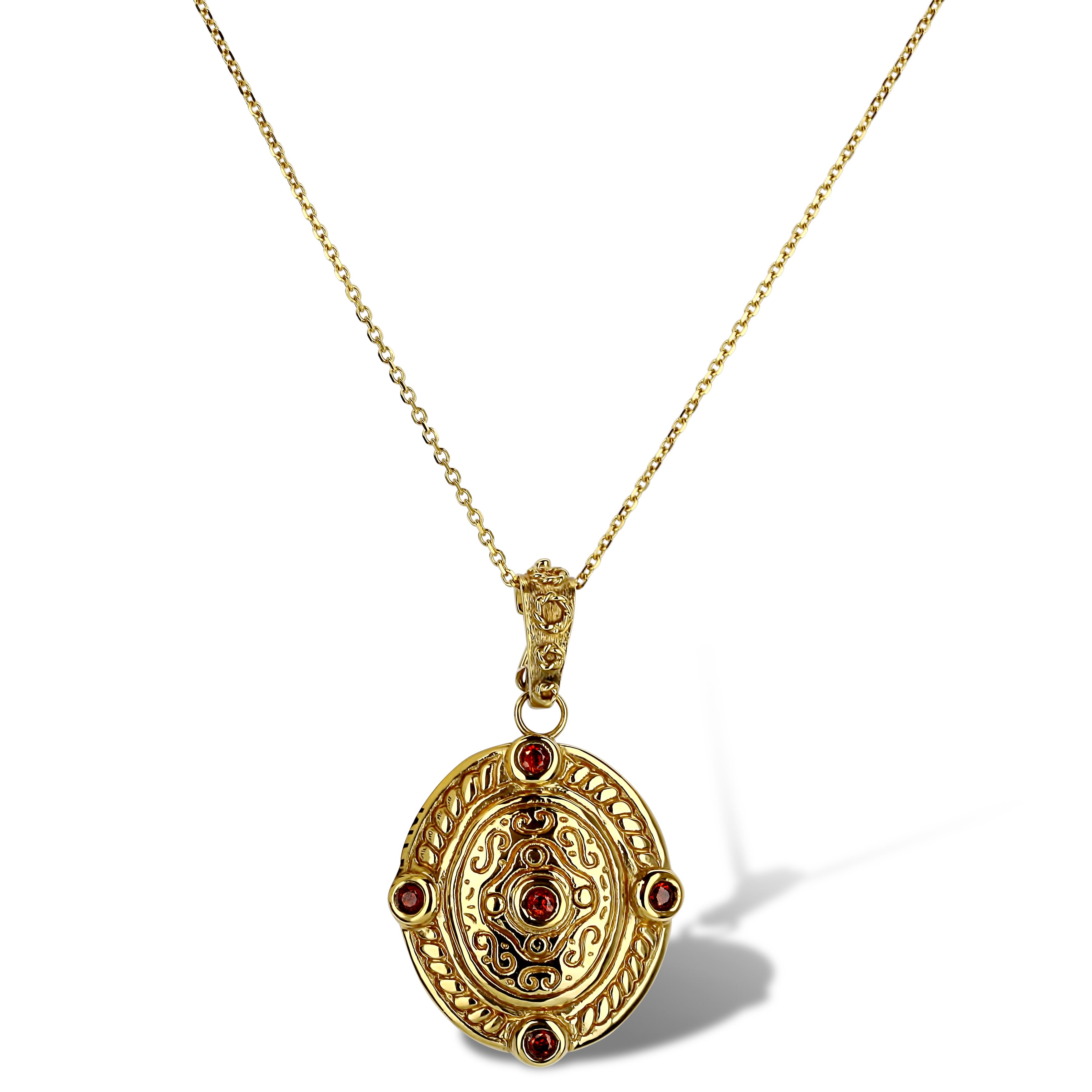 Yellow Gold Oval Pendant With Garnets