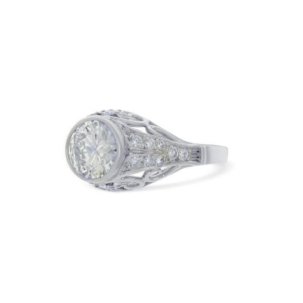 Platinum Filigree Dome Ring With A 1.46 Carat Bezel Set Round Brilliant Diamond